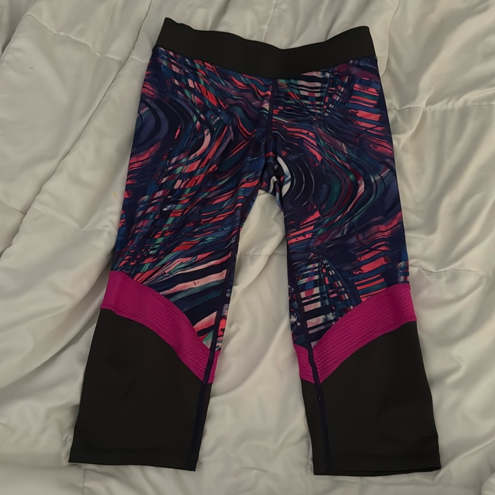 Reebok yoga/capri leggings, multi color with pinks, blues, greens, and purples.